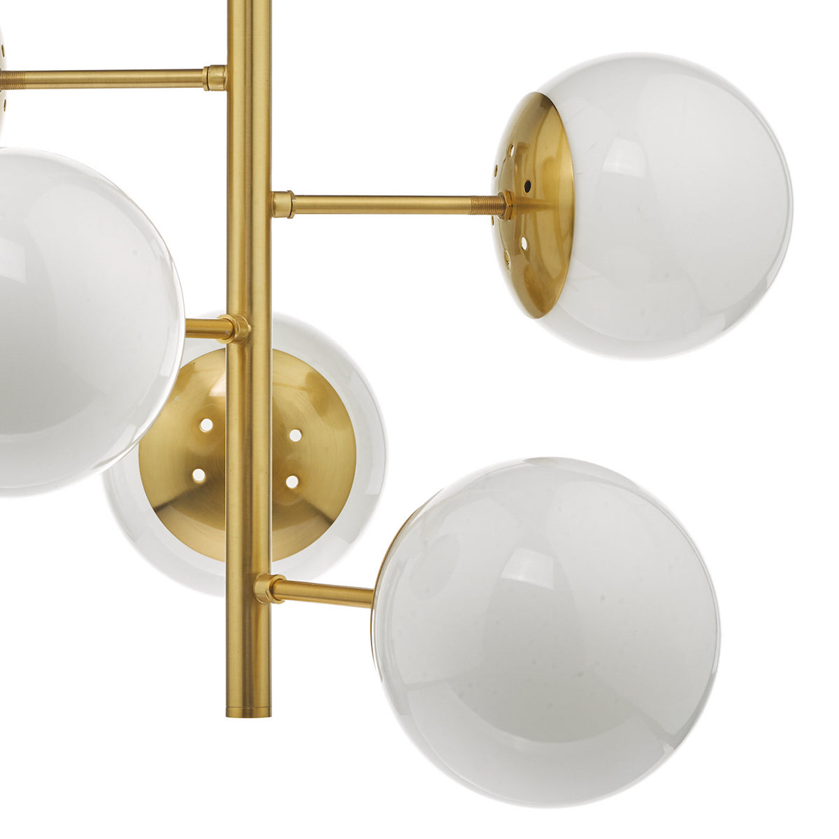 Close up of a brass chandelier with white globe lights