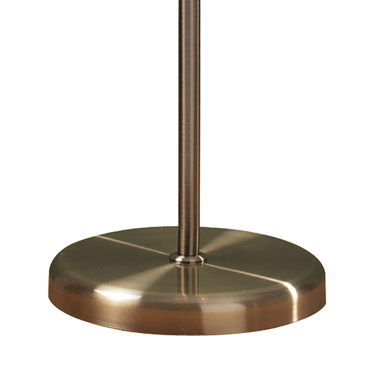 Close-up of a brushed bronze lamp base and pole.