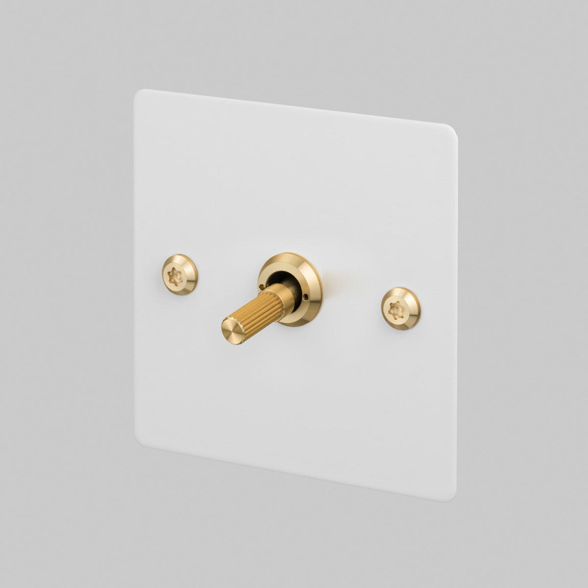 One Gang 2 Way Light Switch in White with Brass Linear Knurled Toggle
