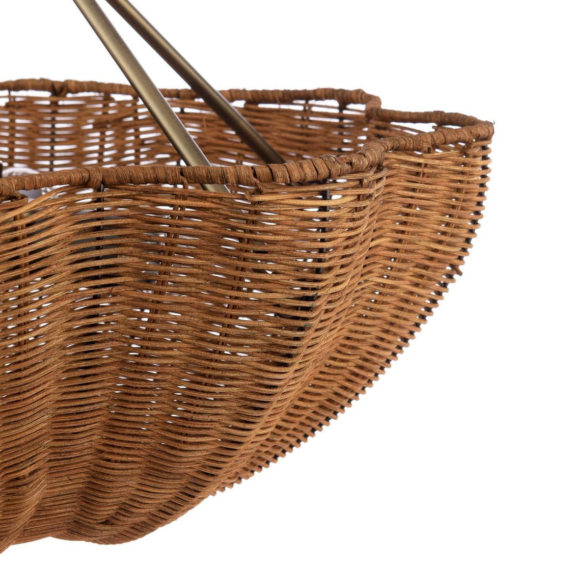 Close up of a scalloped woven rattan pendant light shade with metal frame