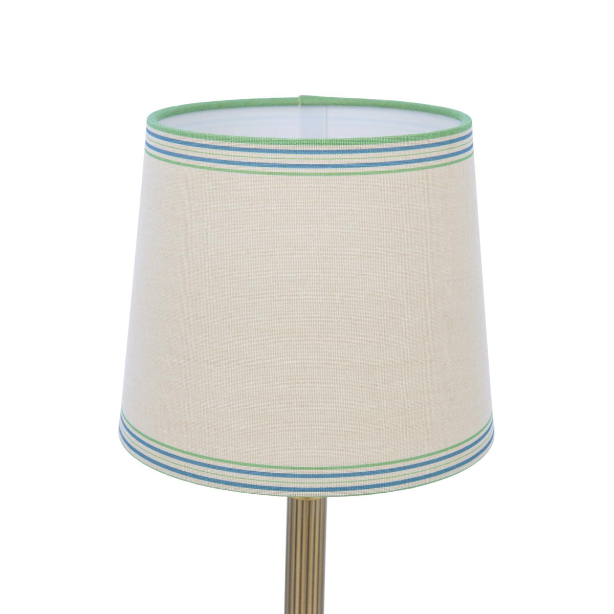 Tapered fabric lampshade with blue and green striped trim on a white background