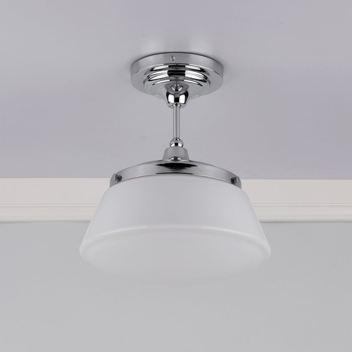 Chrome ceiling light with a white glass shade