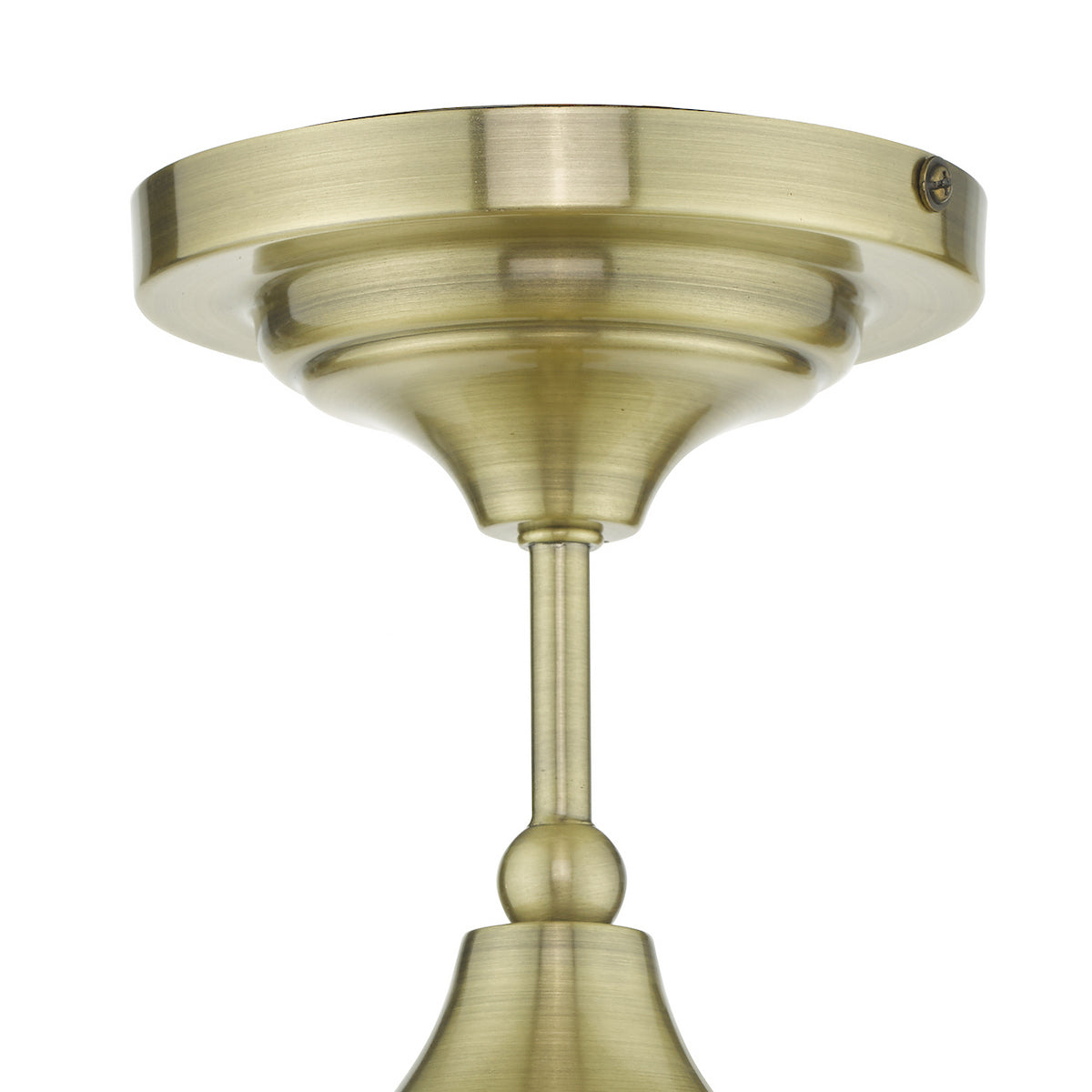 Close up of the antique brass ceiling rose and stem