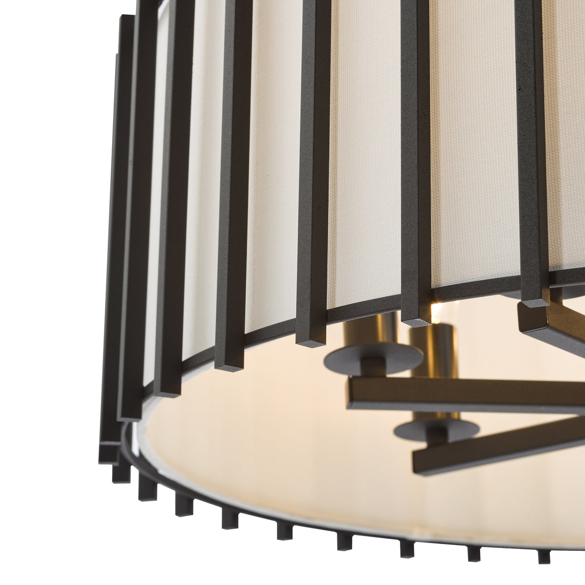 Close up of a black metal and white fabric drum pendant light