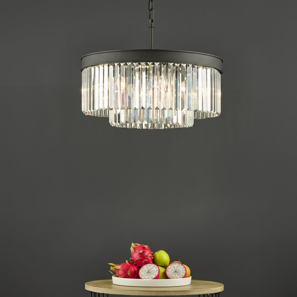 Round chandelier with two tiers of clear crystal rods and a dark metal frame