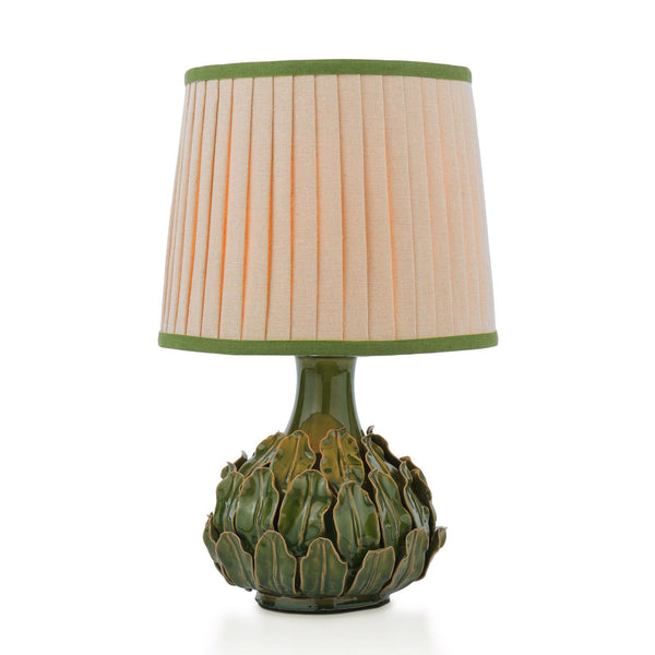 Green ceramic artichoke base table lamp with a pleated beige shade and green trim