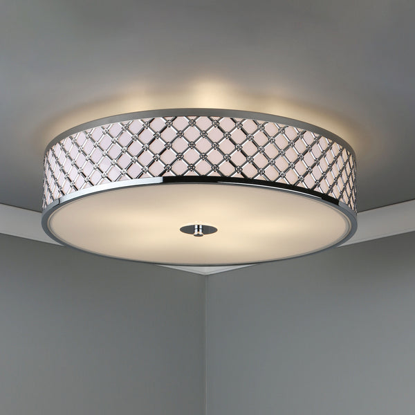 Round ceiling light with a chrome finish and a decorative band of crisscross patterns.