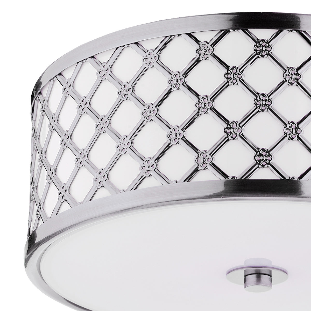 Close-up of a ceiling light with a decorative silver lattice pattern over a white diffuser.