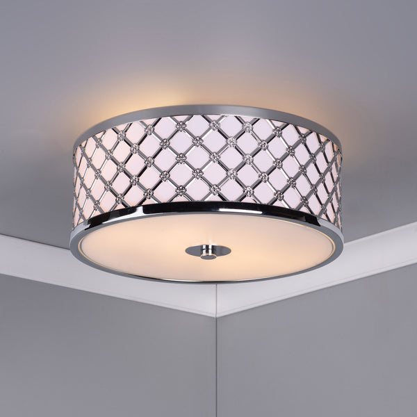 Round ceiling light with a chrome lattice pattern and small crystal accents around its drum shade.