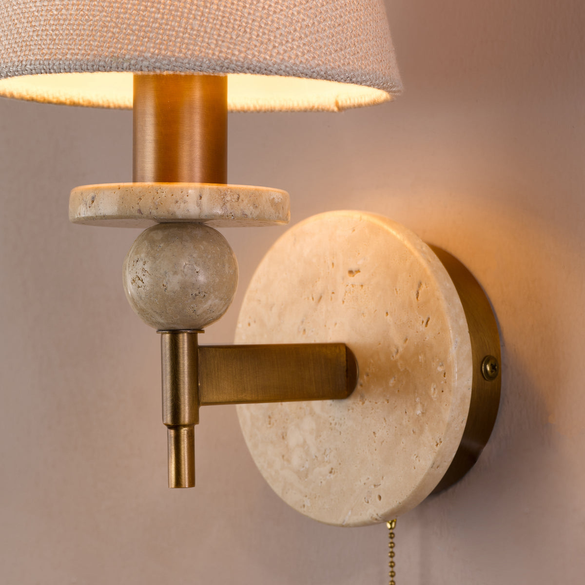 Colenza Switched Wall Light in Antique Bronze and Travertine with Tapered Linen Shade