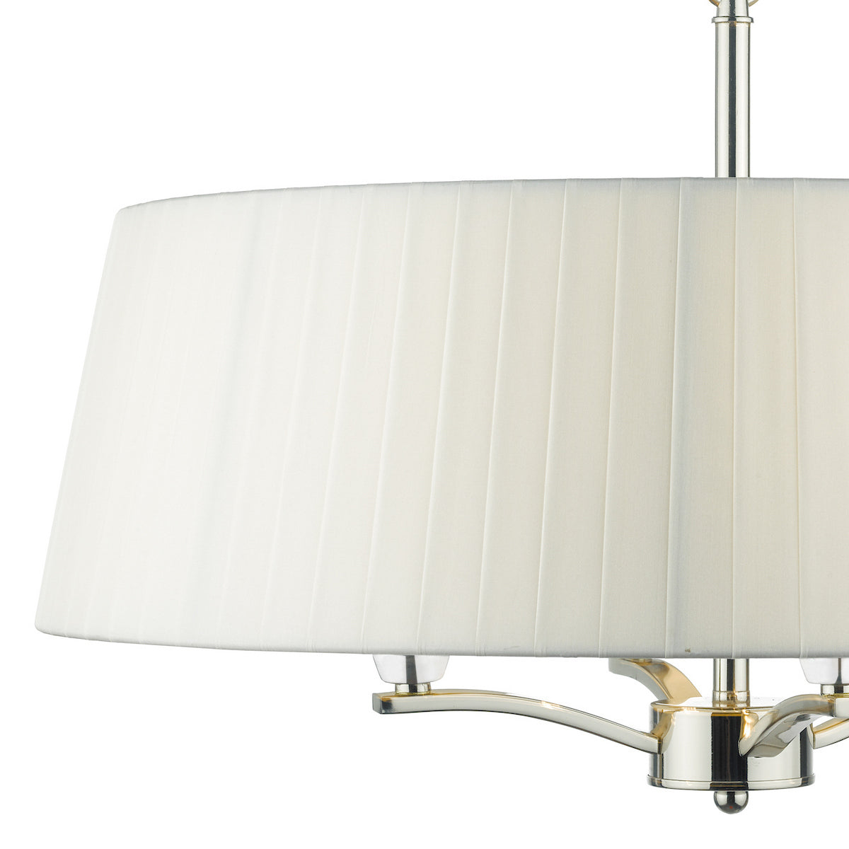 Close-up of a white pleated drum lampshade with a polished nickel base.