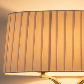 Pleated fabric lampshade illuminated from within