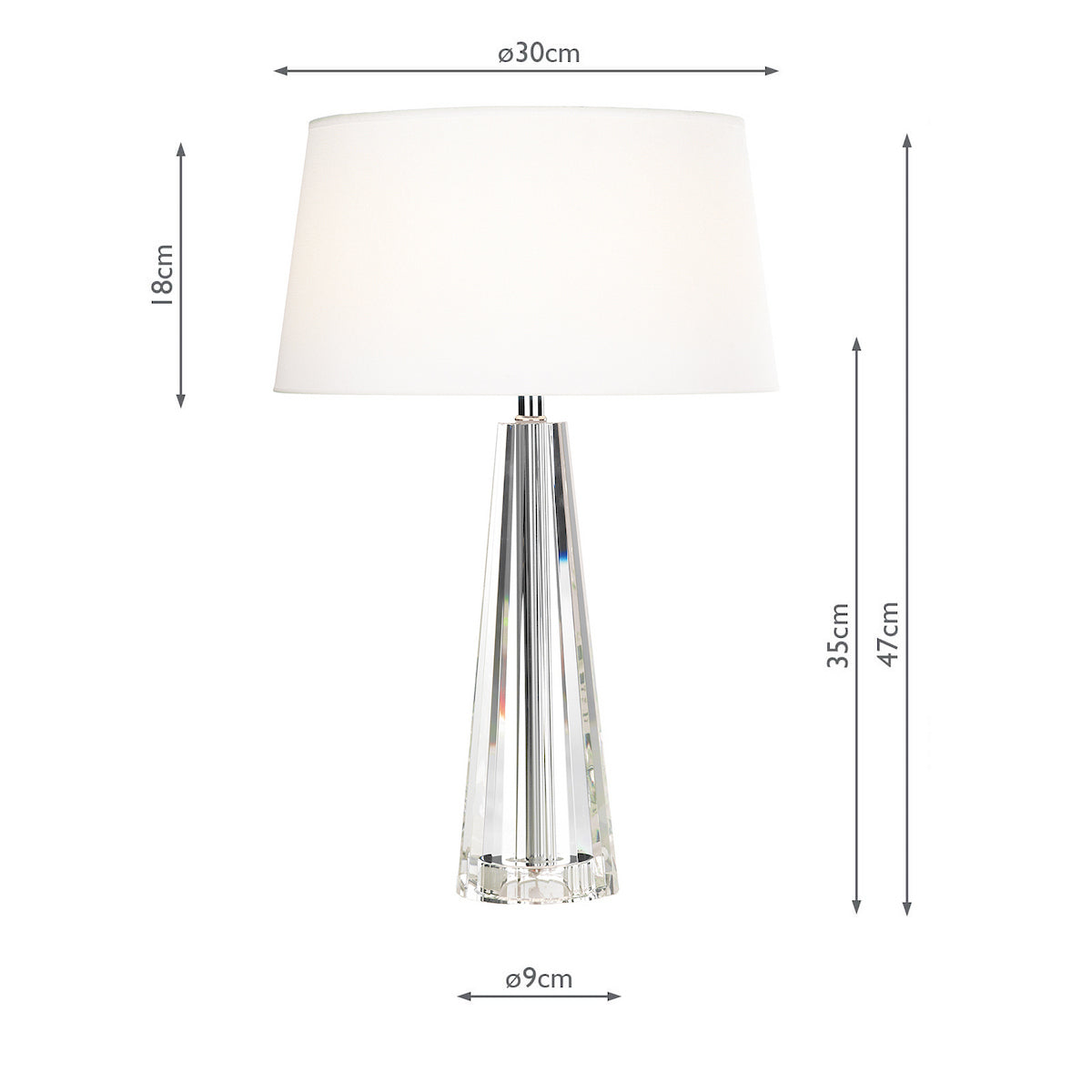 Table lamp with a white shade and a clear, faceted crystal base. Dimensions are shown.