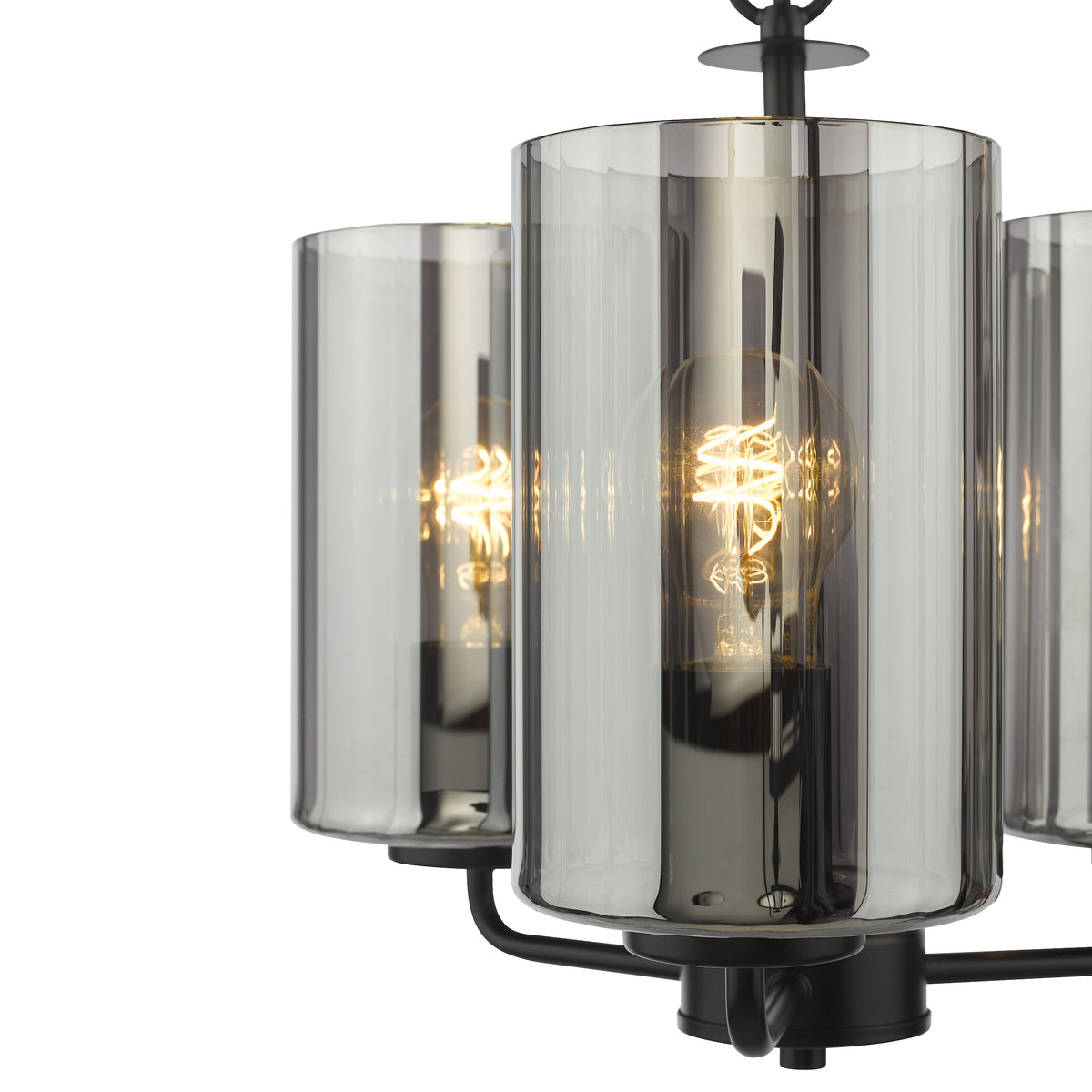Close up of a black chandelier with three glass shades, each containing an illuminated light bulb