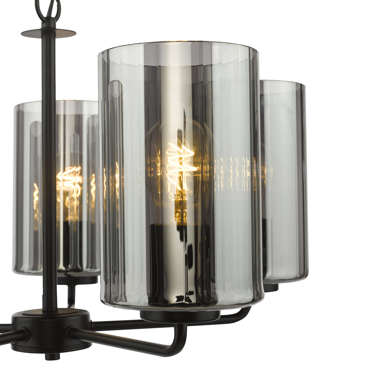 Close-up of a black chandelier with three smoked glass shades and exposed filament bulbs