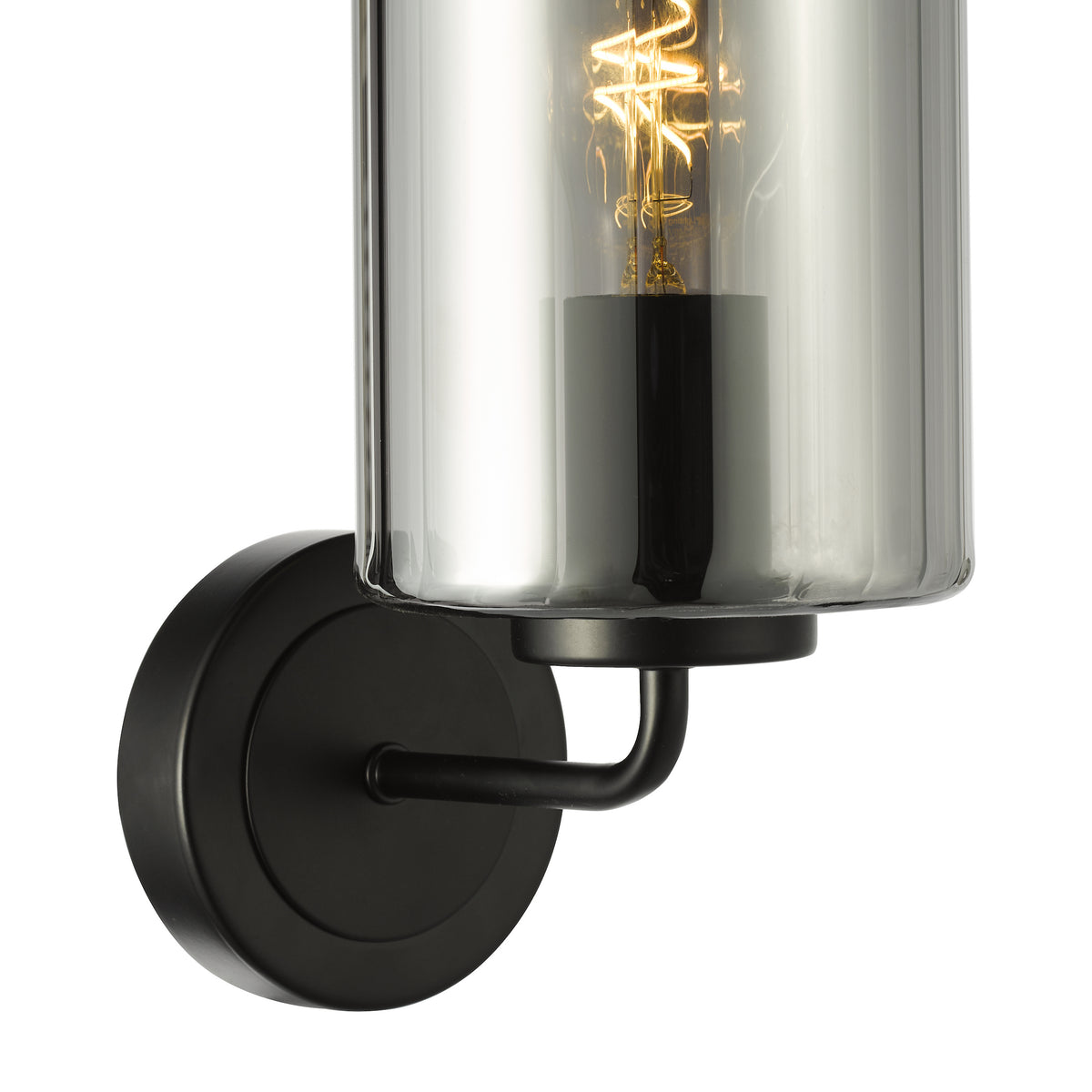 Black wall sconce with a clear glass shade and exposed filament bulb
