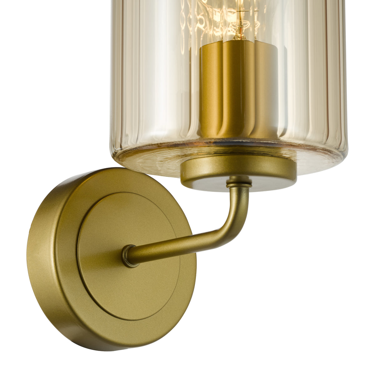 Gold wall sconce with a ribbed amber glass shade and exposed filament bulb