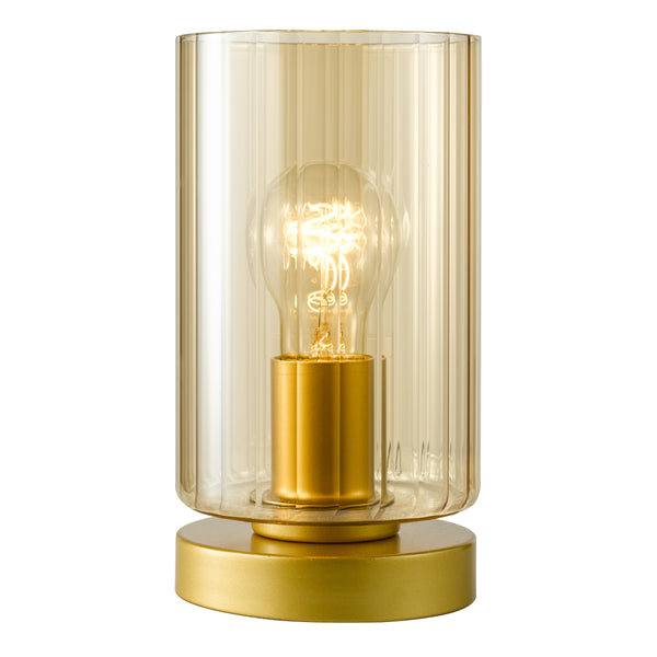 Gold table lamp with a ribbed glass shade and an exposed filament bulb