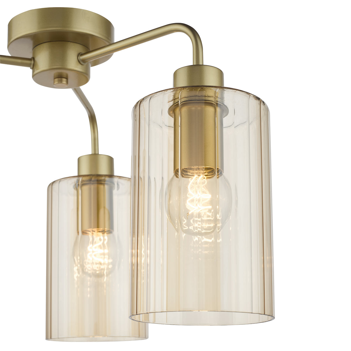 Close up of a brass ceiling light with two ribbed glass shades