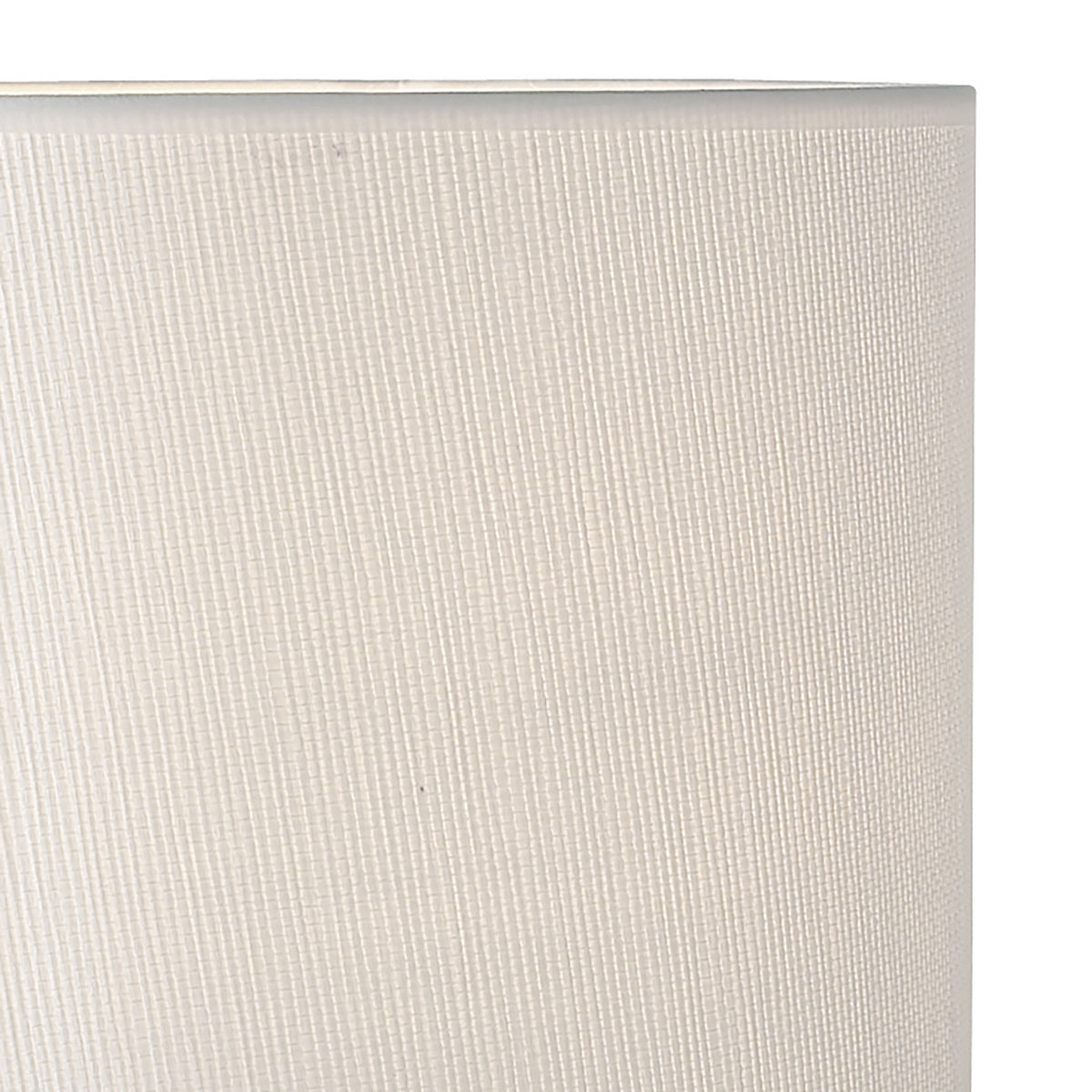 Close-up of a white fabric lampshade with a subtle vertical texture.