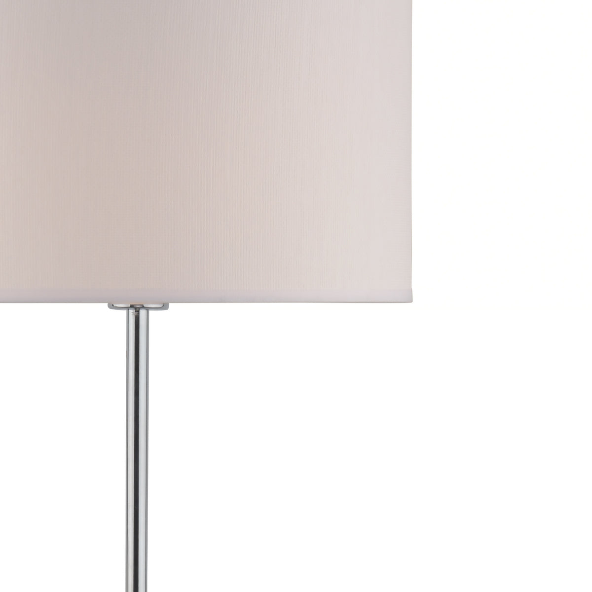 Close-up of a white rectangular lamp shade with a chrome stand.