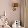 Dijon Wall Light in Antique Bronze with Tapered Brown Rattan Shade