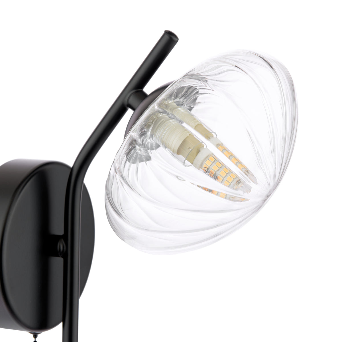 Black wall light with a clear, ribbed glass shade and an exposed LED bulb