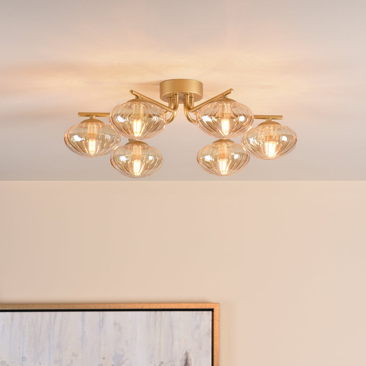 Gold ceiling light with six ribbed glass shades