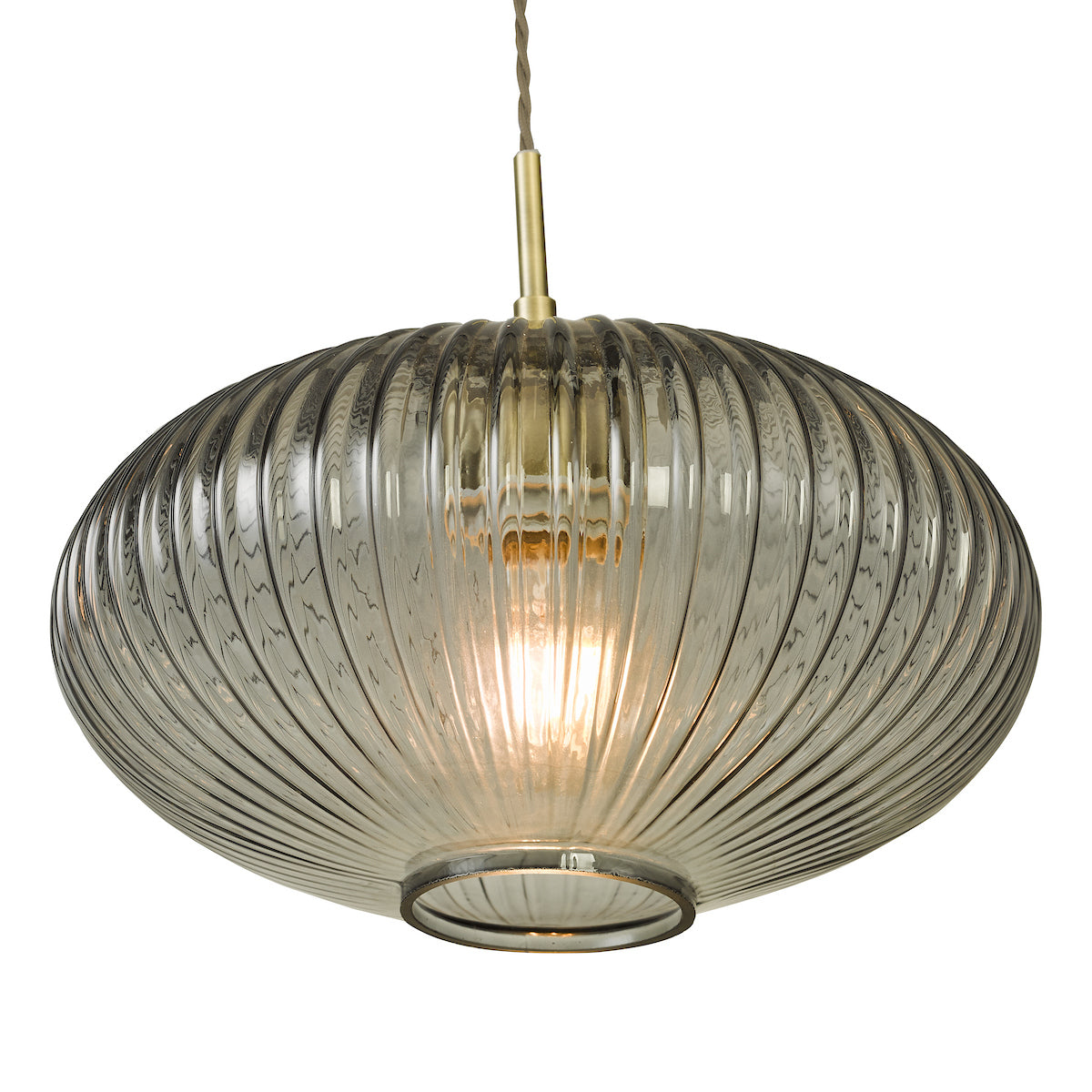 Ribbed glass pendant light with a warm glow, suspended from a brass fixture and braided cord.