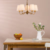 Elara Five Arm Pendant in Antique Bronze with Tapered Linen Shade