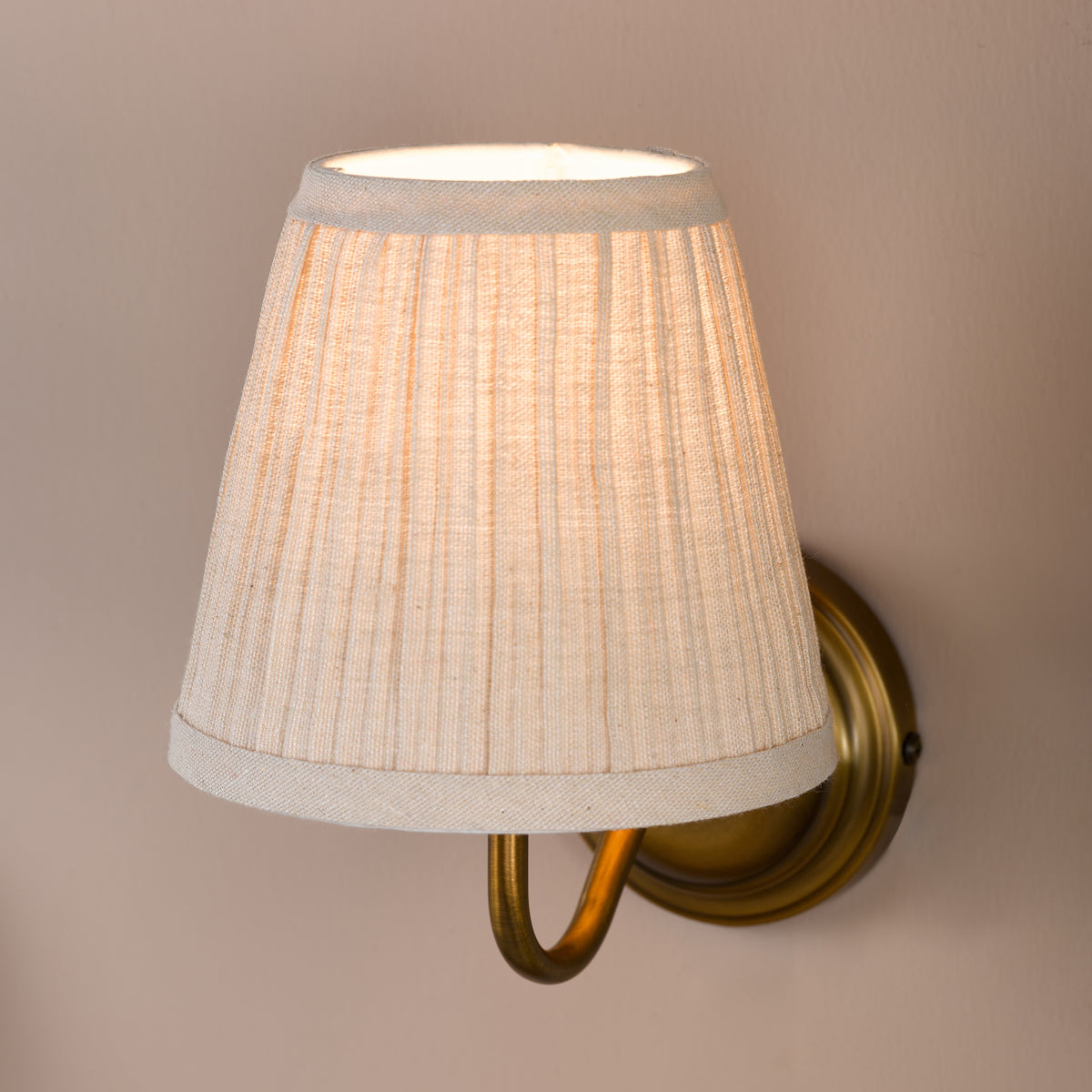 Elara Switched Wall Light in Antique Bronze with Pleated Linen Shade