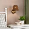 Elara Switched Wall Light in Antique Bronze with Tapered Brown Rattan Shade
