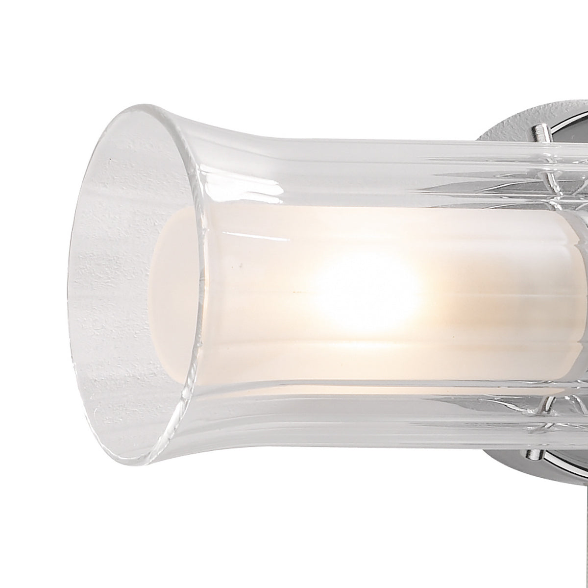 Close-up of a clear glass light fixture with a glowing bulb inside.