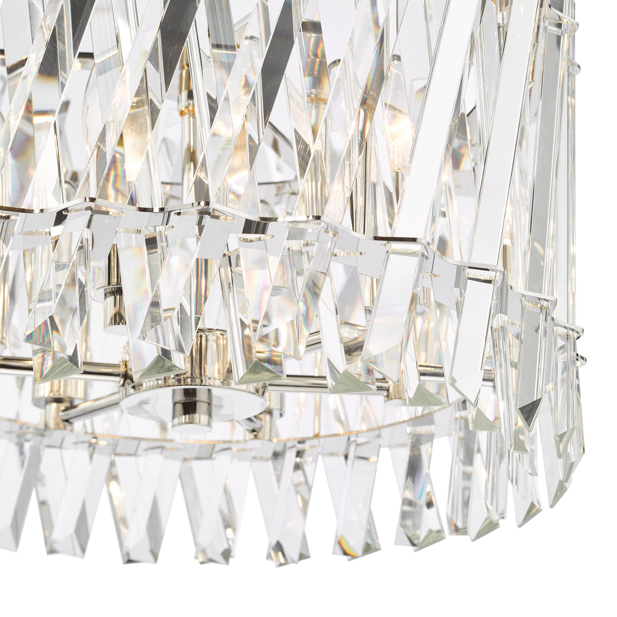 Close up of a crystal chandelier with multiple clear, rectangular crystal pieces arranged in a circular pattern