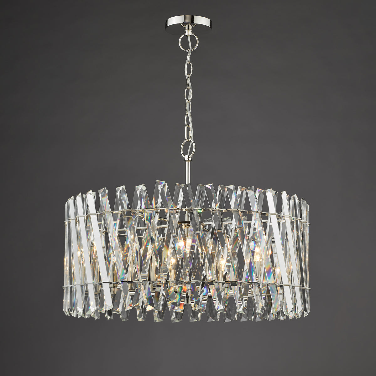 Crystal chandelier with a polished chrome finish and a drum shade design