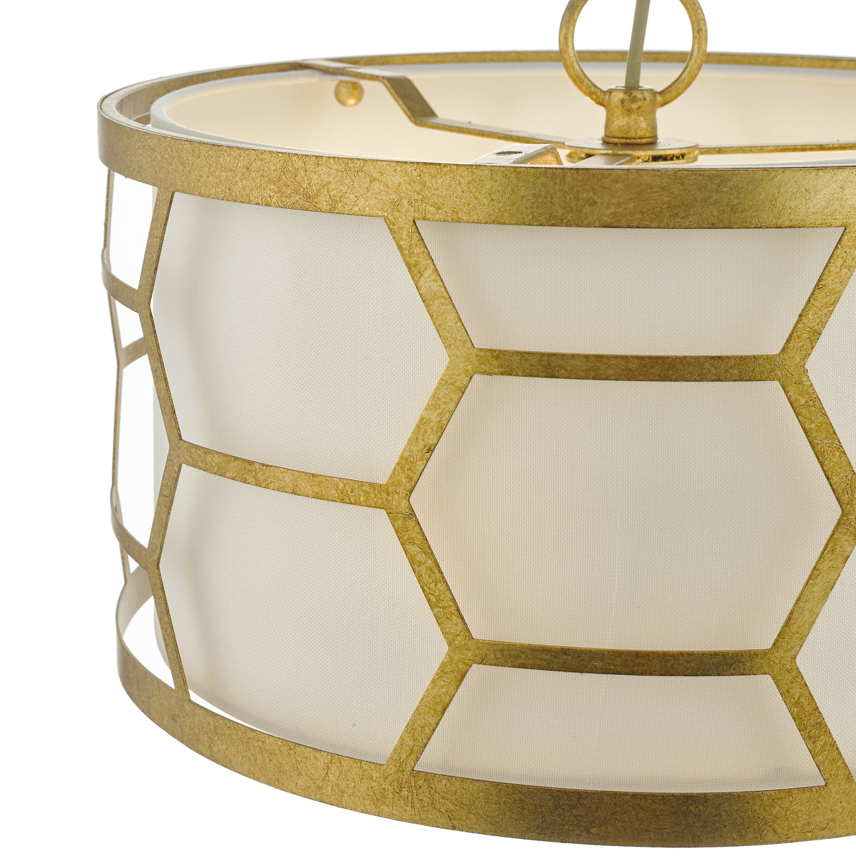 Close up of a gold metal and white fabric drum pendant light