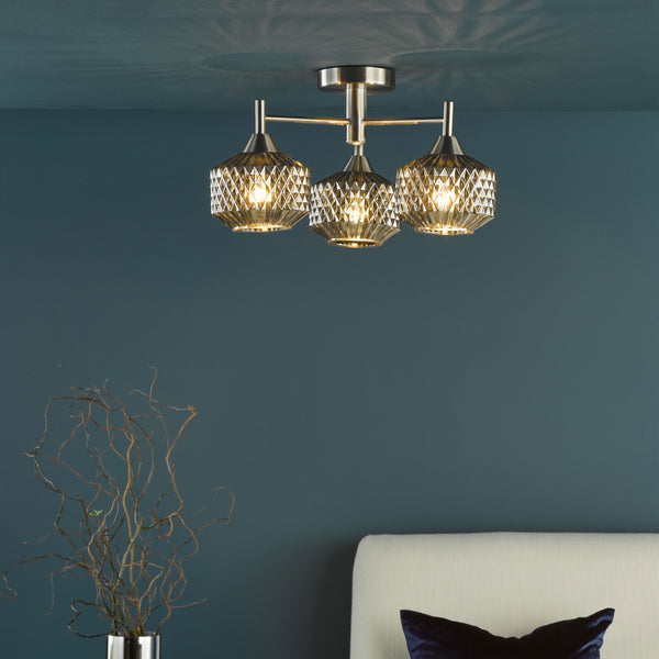 Three light ceiling fixture with textured glass shades