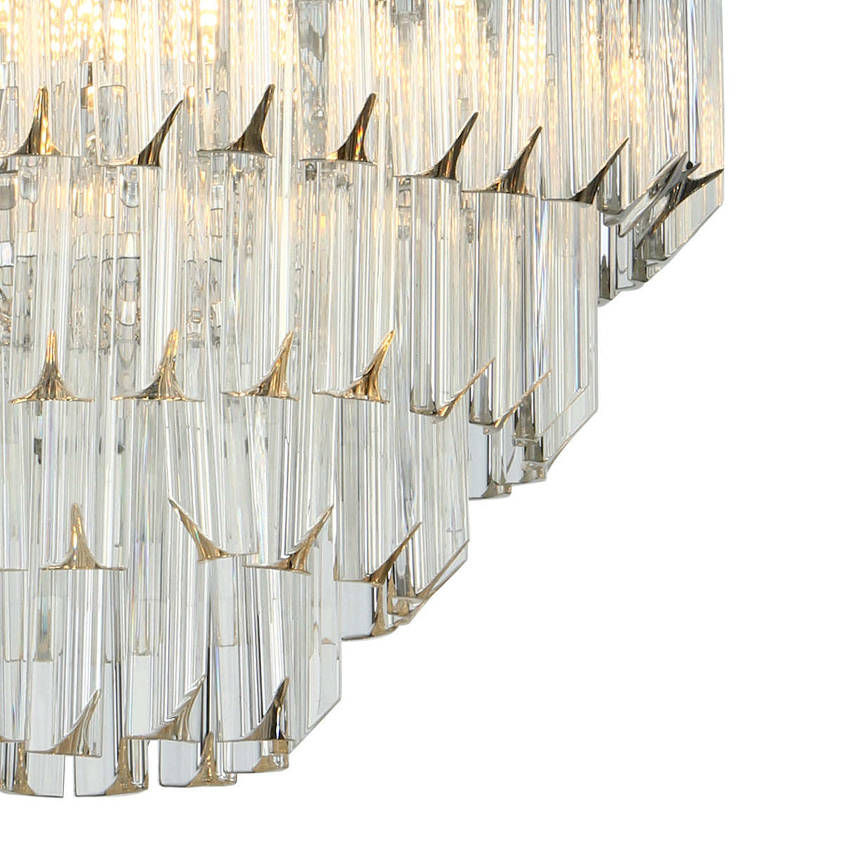 Close-up of a tiered crystal chandelier with gold accents