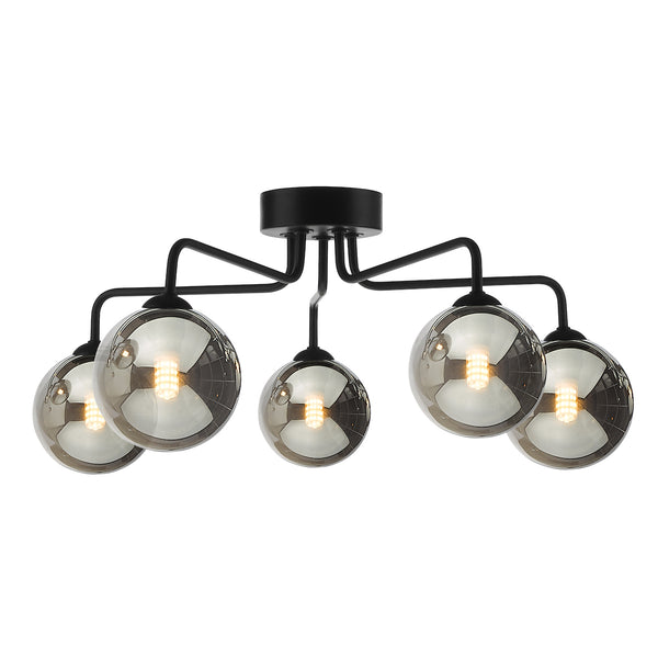 Black ceiling light with five smoked glass globe shades, each with an illuminated bulb inside.