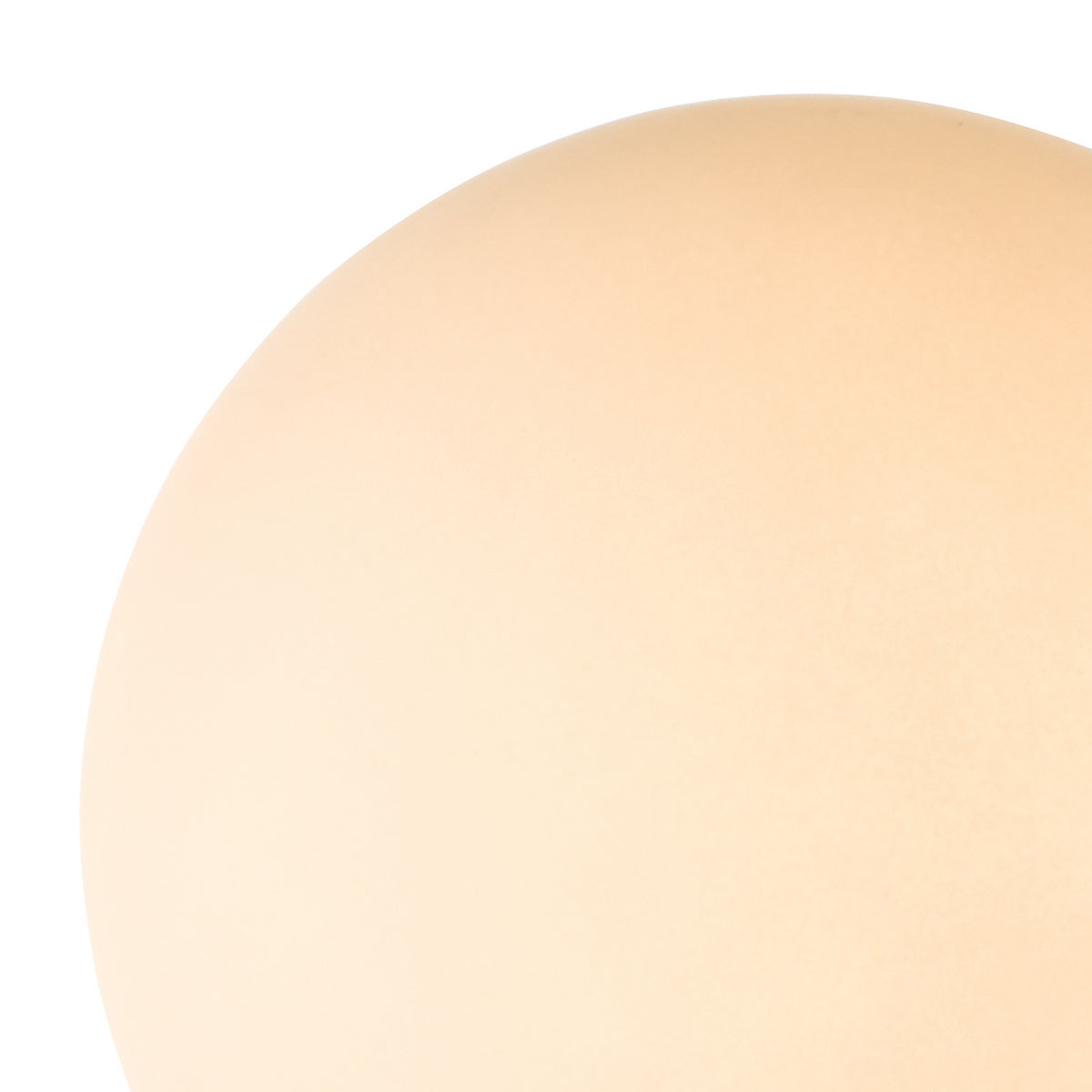 Close-up of a light beige, smooth, curved surface against a white background.