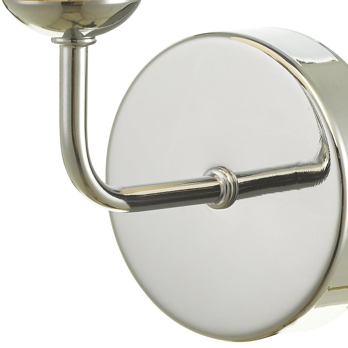 Polished nickel wall sconce with a curved arm and circular backplate.