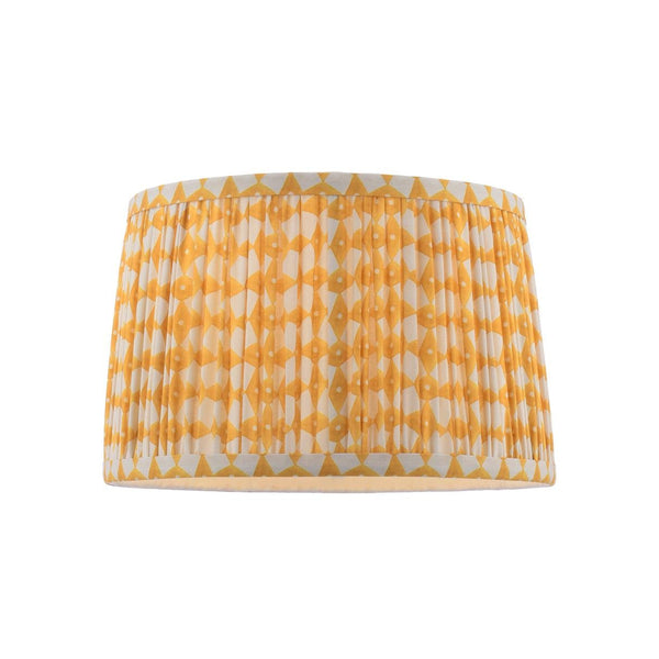 Drum lampshade with yellow and white geometric pattern and pleated fabric