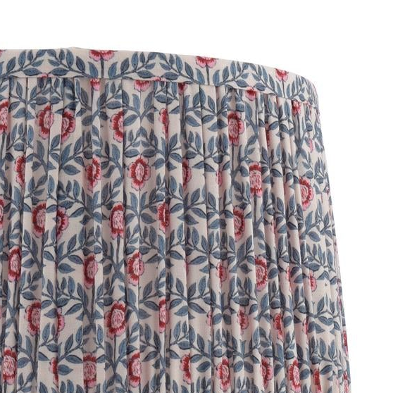 Pleated lampshade with a pink and blue floral block print pattern