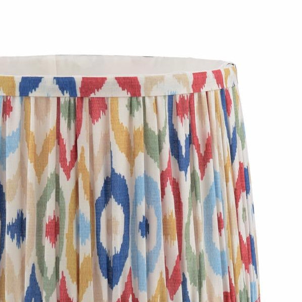 Joules Folly 25cm tapered pleated cotton drum shade with a multi colour ikat pattern