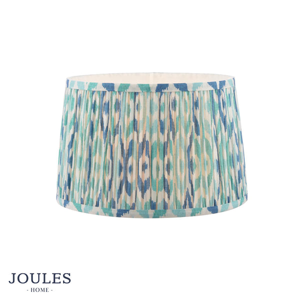 Joules Home pleated drum lampshade with a blue and teal ikat pattern