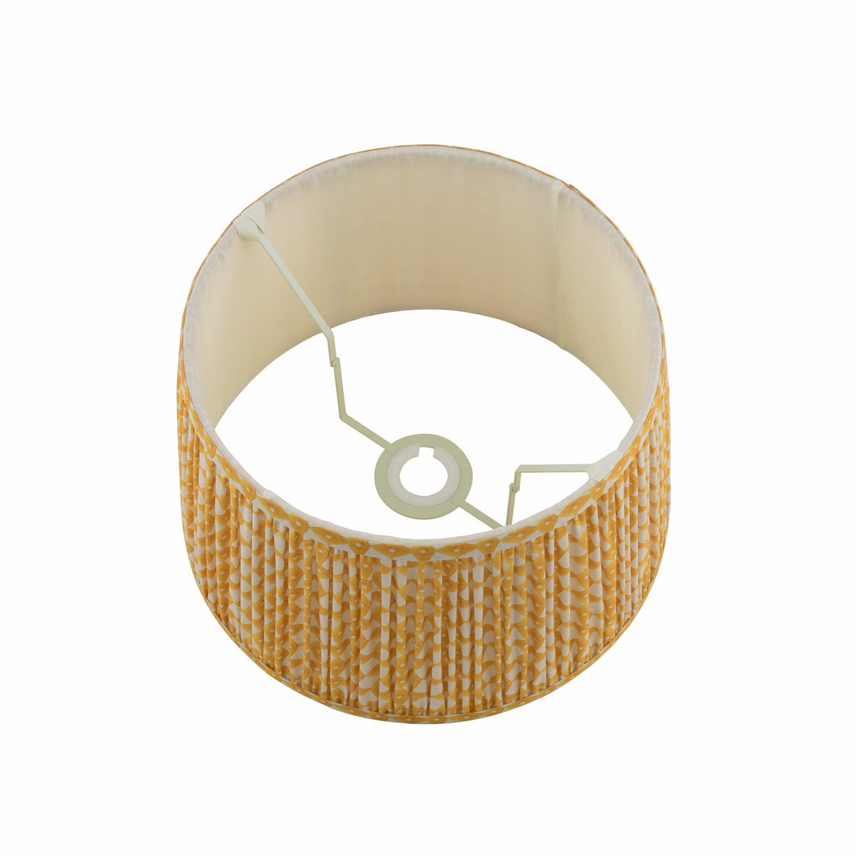Yellow patterned pleated drum lampshade with white interior lining