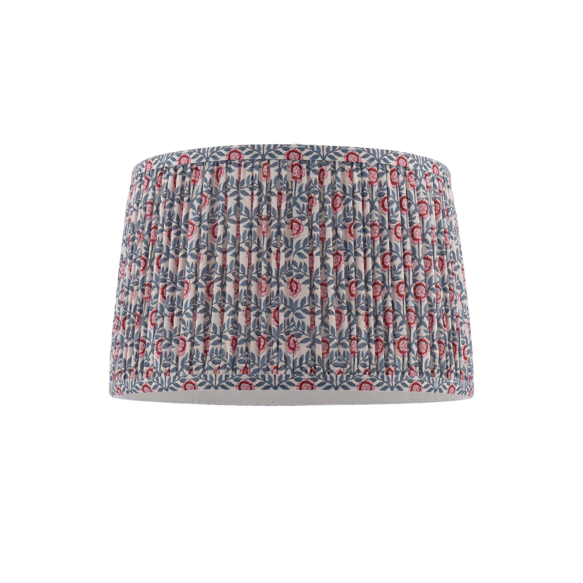 Drum lampshade with pleated fabric featuring a floral pattern in red and blue on a cream background