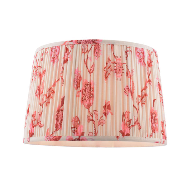 Pleated drum lampshade with pink and red floral pattern on cream background