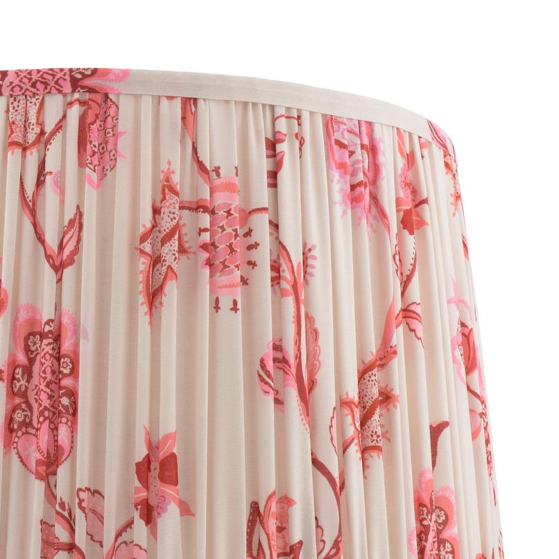 Pleated lampshade with pink and red floral pattern on cream background