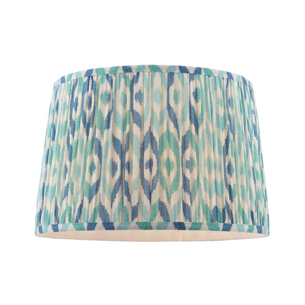 Drum lampshade with blue and teal ikat pattern